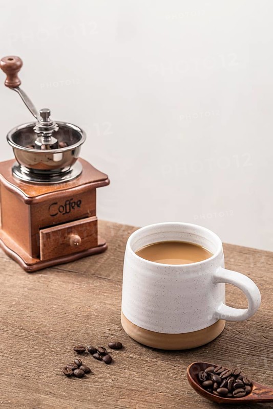 High angle coffee grinder with mug coffee beans