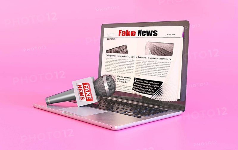 Laptop with fake news webpage microphone