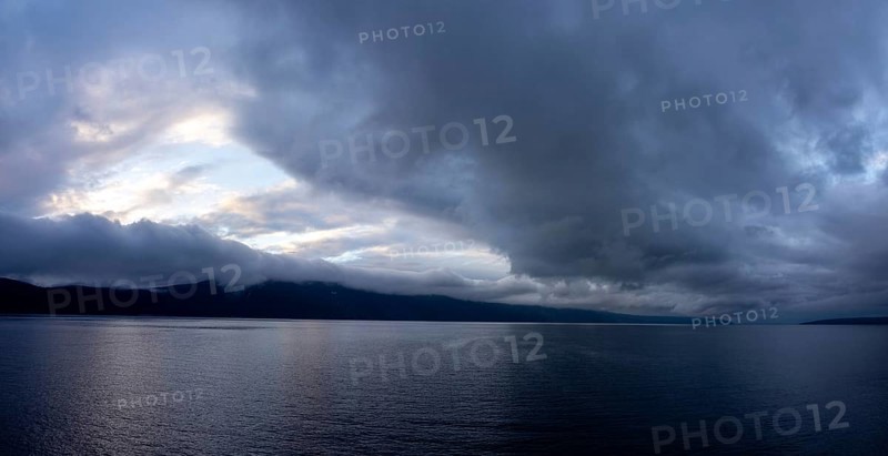 Storm clouds by the sea over the island of Cres, panoramic shot, Kvarner Bay, Croatia, Europe