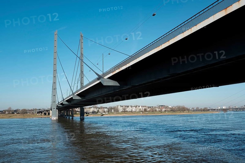 View over the Rhine with Rheinkniebrücke, behind it Oberkassel, Düsseldorf, Germany, Europe