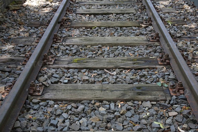 Rails with old wooden sleepers as part of the Gleis 17 memorial site, former Grunewald goods station, Charlottenburg-Wilmersdorf district, Berlin, Germany, Europe