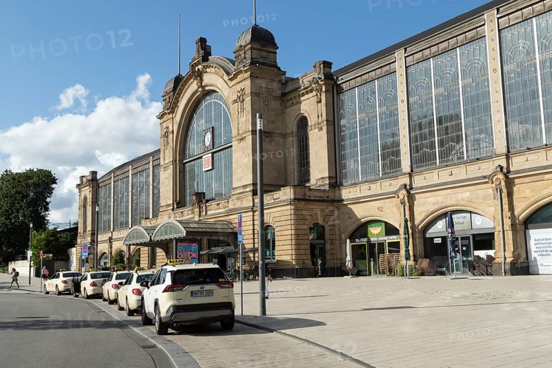 Taxis parked at a taxi rank in front of Dammtor train station in Hamburg, Germany, Europe