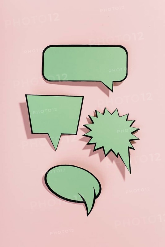 Green speech bubbles with black border pink background
