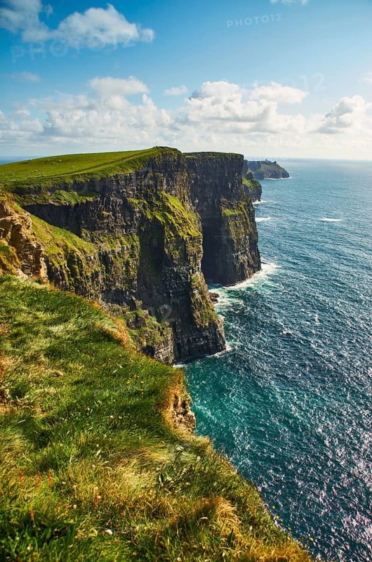 Cliffs of moher in county Clare, Ireland. One of the most popular tourist destinations. Sunny summer day