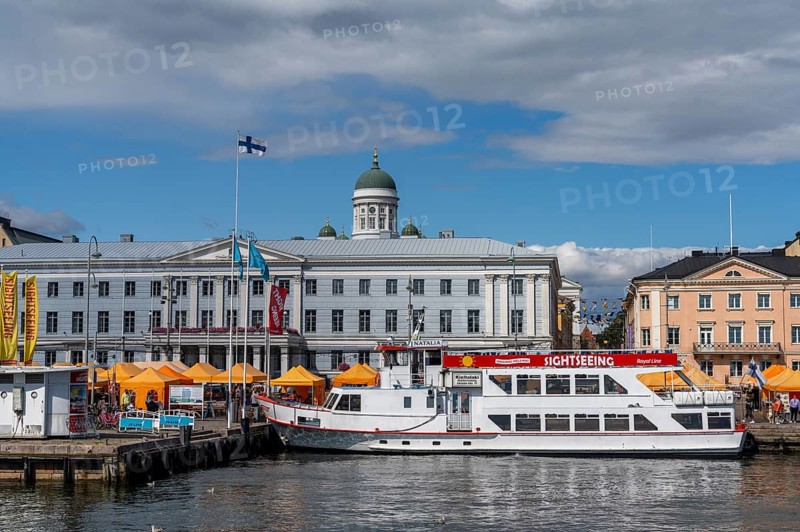 Helsinki, Finland: 4 August, 2021: a sightseeing boat in the harbor in Helsinki with tourists on a boat cruise