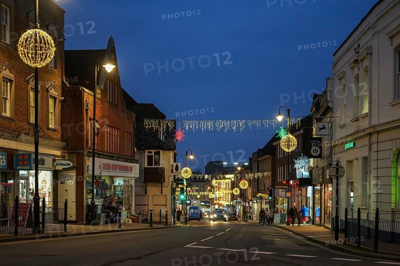 EAST GRINSTEAD, WEST SUSSEX, UK - DECEMBER 16 : Christmas decorations and lights in East Grinstead, West Sussex on December 16, 2021. Unidentified people
