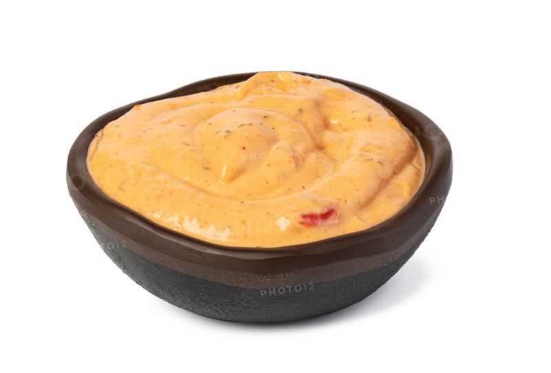 Bowl with Cocktail sauce isolated on white background