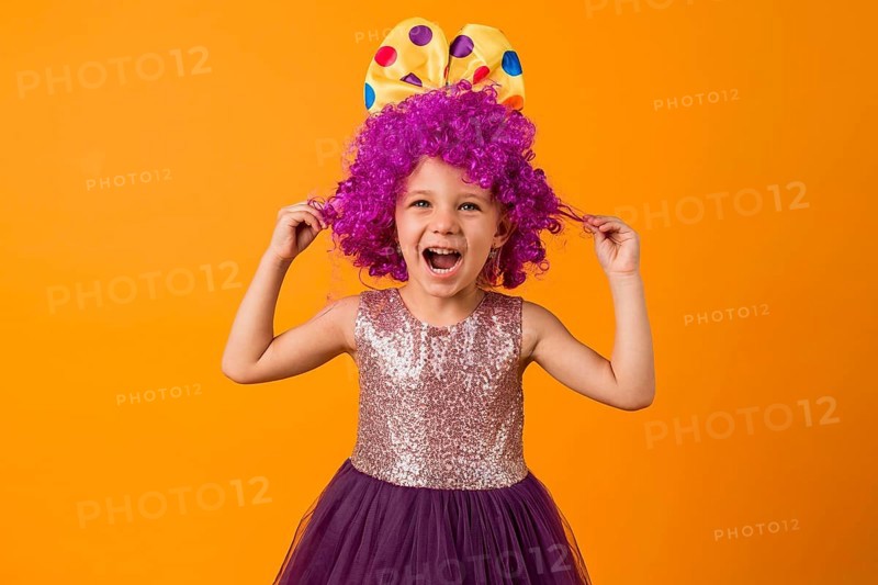 Cute girl with clown wig