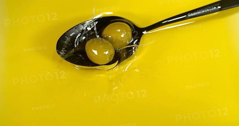 Green Olive, Olea europaea, Falling in a Spoon