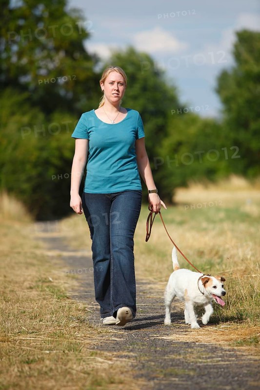 Woman with Parson Russell Terrier on leash, Parson Jack Russell Terrier, dog leash, walking, dog walk, leashed, loose leash