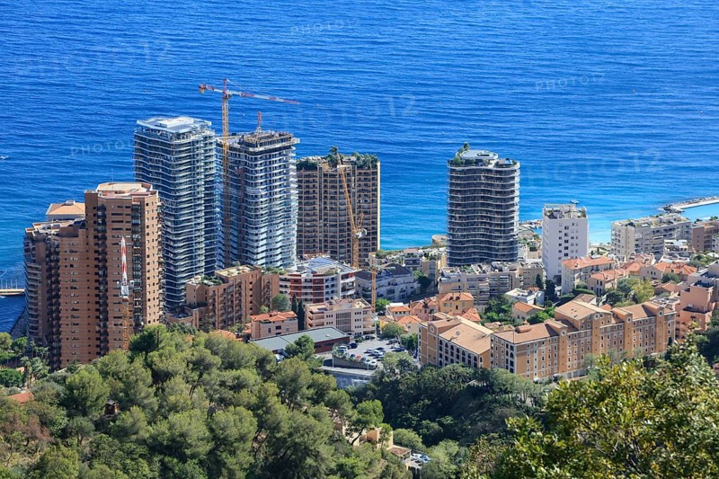 Easternmost part of the Principality of Monaco at the Monte Carlo Bay Hotel with the Testimonio skyscrapers under construction, seen from the Moyenne Corniche, Alpes-Maritimes department, Provence Alpes Cote d'Azur region, France, Mediterranean Sea, Europe