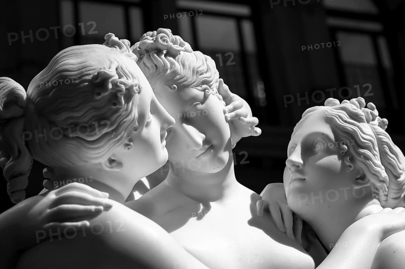 MILAN, ITALY - CIRCA JUNE 2020: Antonio Canova?s statue The Three Graces (Le tre Grazie). Neoclassical sculpture, in marble, of the mythological three charites (made in Rome) (1814-1817)