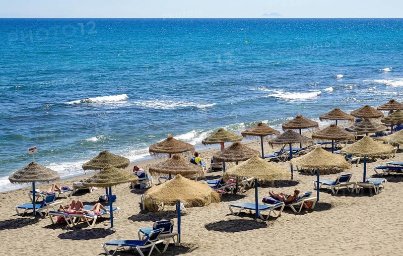 MARBELLA, ANDALUCIA/SPAIN - MAY 4 : View of the beach in Marbella Spain on May 4, 2014. Unidentified people