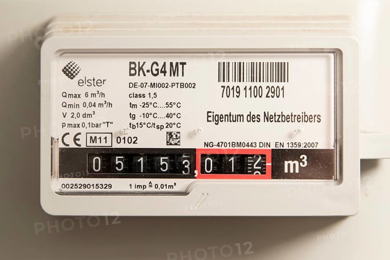 Symbolic image of energy costs in the household, natural gas, analogue gas meter in a flat, Hamburg, Germany, Europe