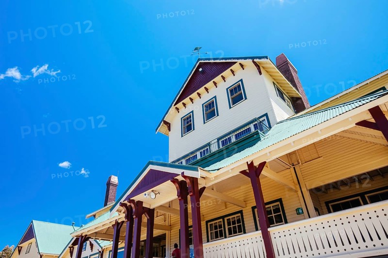 MT BUFFALO, AUSTRALIA- DECEMBER 29 2021: The Mount Buffalo Chalet on a warm summer's day. It was built in 1910 as Australia's first ski resort in the Victorian Alps and is a historic landmark in Victoria, Australia, Oceania
