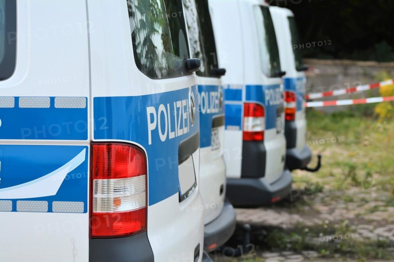 Parked police car during a police operation