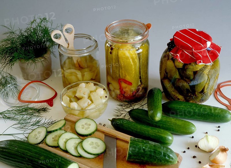 Preserved mustard gherkins and pickled cucumbers Still life