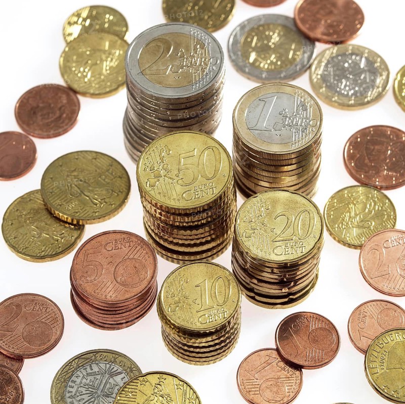 Piles of Euro Coins against White Background