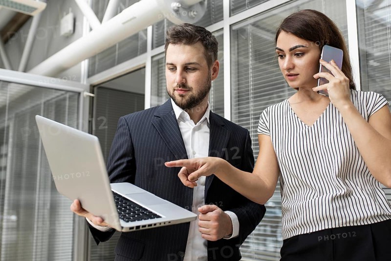 Colleagues planning business project together