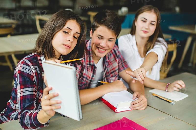 Cheerful students playing classroom