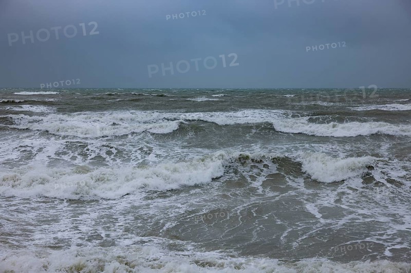 Stormy sea, foaming sea in storm with high waves on the English Channel, Portbail, Cotentin, Manche, Normandy, France, Europe