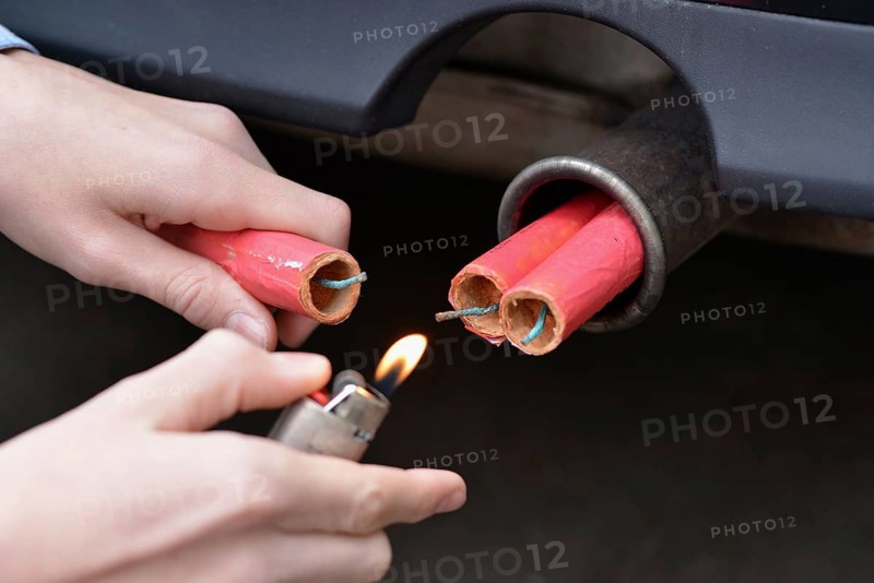 Chinese firecrackers in car exhaust, lighter, firecrackers, fireworks, firecrackers, Chinese firecrackers, ignite, destruction, destructiveness, damage to property, Chinese firecrackers, fireworks