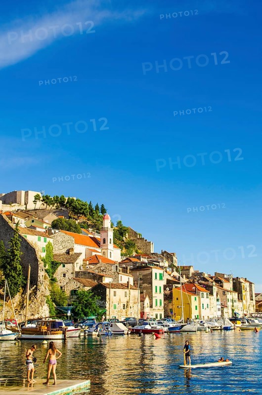 Croatia, 21 07 2014: Old town streets in town Sibenik with marble and stone buildings in background. Tourist place to visit, Europe