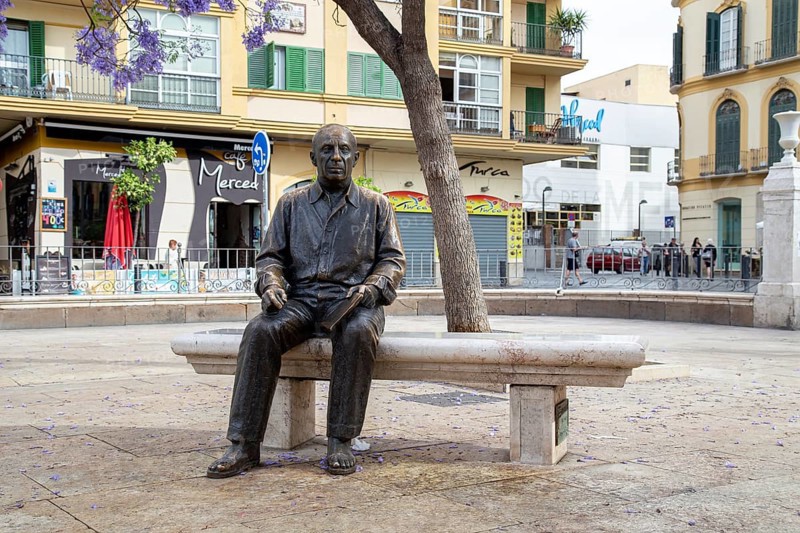 Malaga, Spain, May 24, 2019: Bronze statue of famous painter and sculptor Pablo Picasso. It was made by Francisco Lopez Hernandez and was inaugurated in 2008, Europe