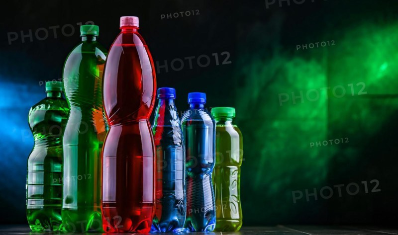 Plastic bottles of assorted carbonated soft drinks