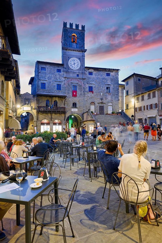 Cortona Arezzo Tuscany Italy. Palazzo del Popolo in Piazza della Repubblica at sunset
