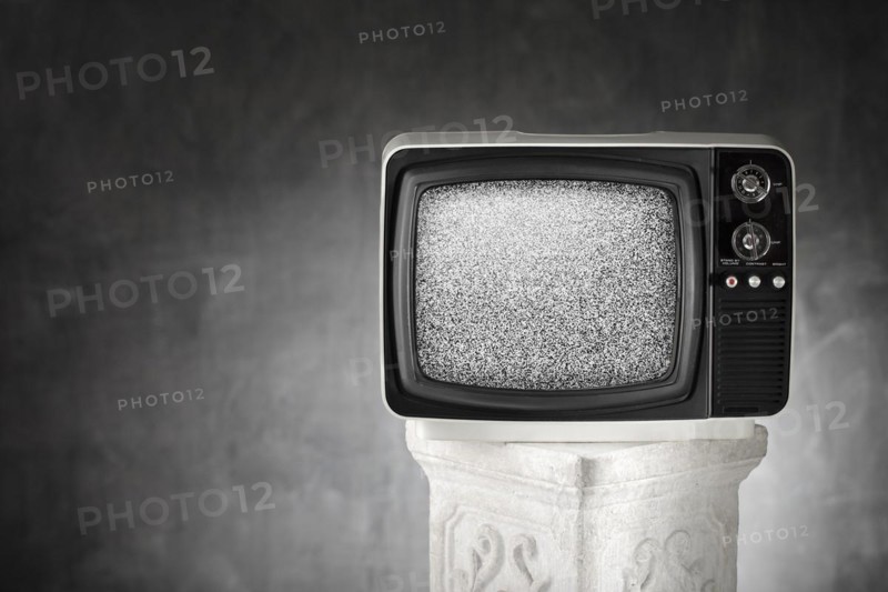 Old portable television with static noise