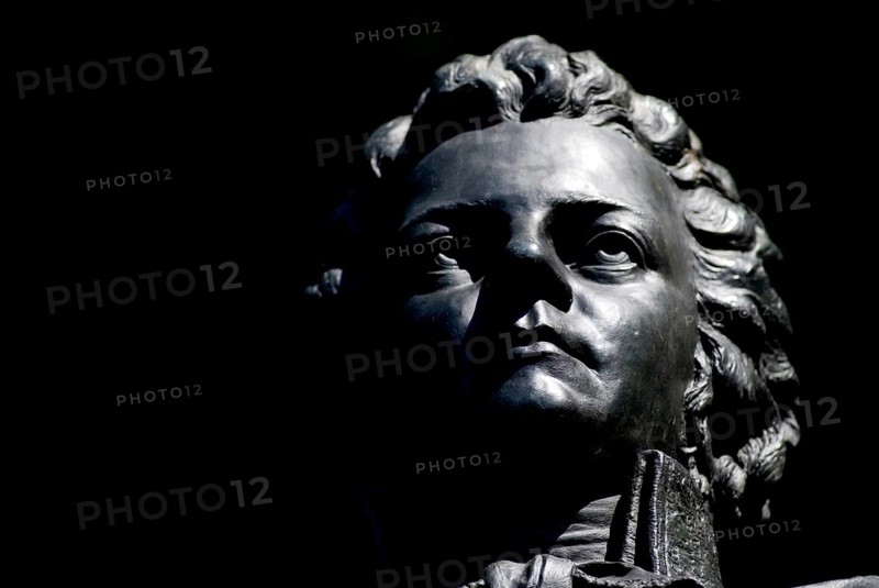 Closeup of Bronce Portrait of Wolfgang Amadeus Mozart on Kapuzinerberg, Salzburg, Austria, Europe