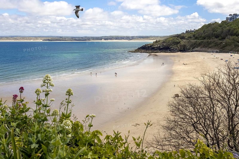 ST IVES, CORNWALL, UK - MAY 13 : View of Porthminster beach in St Ives, Cornwall on May 13, 2021. Unidentified people