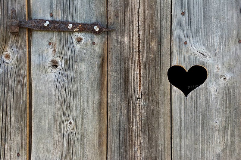 Old wooden door with heart