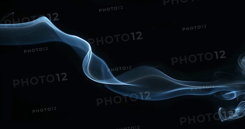 Smoke of Cigarette rising against Black Background