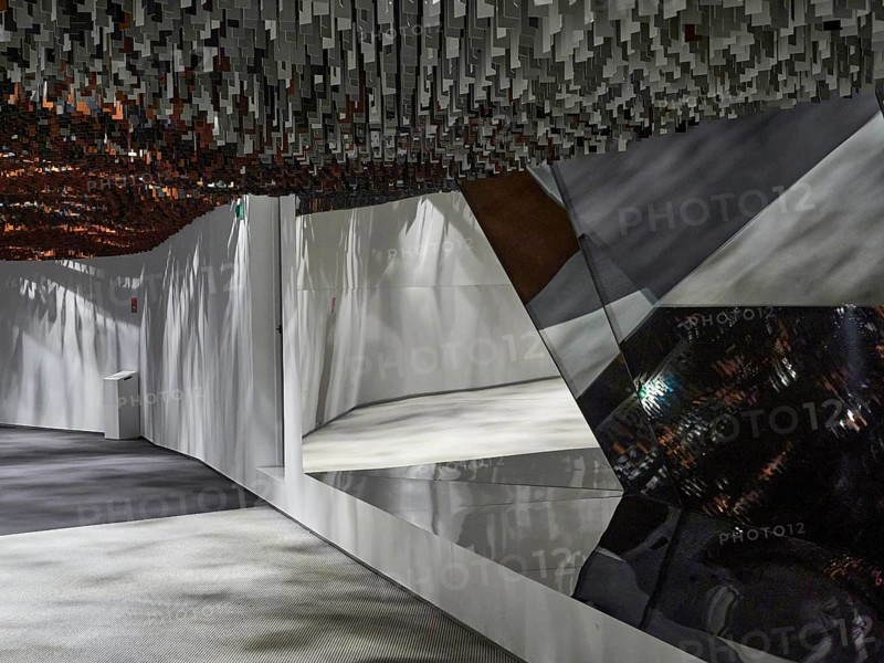 Futuristic interior with geometric shapes and reflective, metallic surfaces, interior design Philharmonie de Paris. Paris