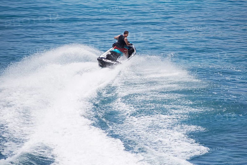 Spain, Majorca, Balearic Islands, Calvia region, Santa Ponca, Port Adriano, jet ski, on the sea, at full speed, man, m58, while driving, sea, waves, Europe