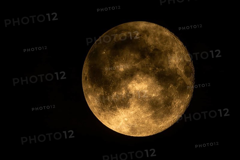 Super moon one day after full moon, moon behind clouds, Braunschweig, Lower Saxony, Germany, Europe