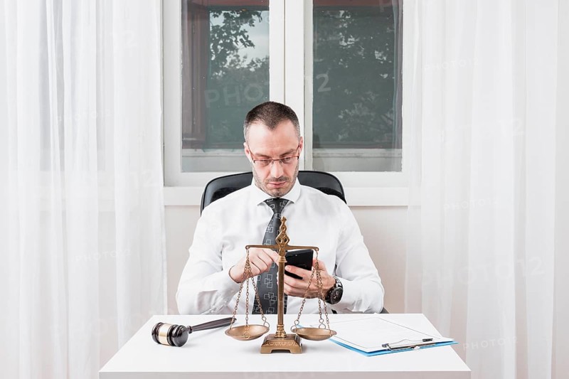 Lawyer with smartphone