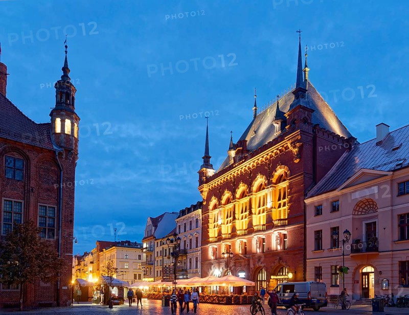 The Areszt sledczy in the medieval old town of Thorn, illuminated in the evening. The historic city centre of Torun is a UNESCO World Heritage Site. Torun, Kujawsko-Pomorskie, Poland, Europe