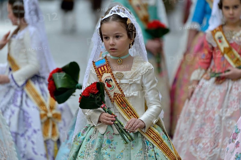 Fallas festival, girls in a traditional costume during the parade in the Plaza de la Virgen de los Desamparados, Valencia, Spain, Europe