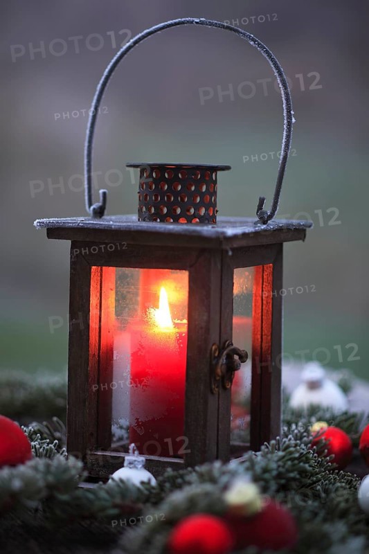 Lantern with burning candle, Christmas decoration