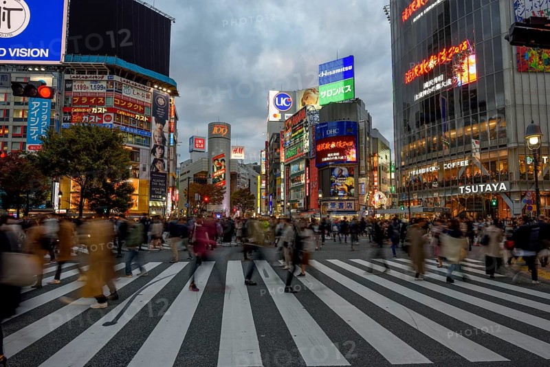 People cross the Shibuya crossroads, most frequented crossroads in the world, Shibuya, Tokyo, Japan, Asia