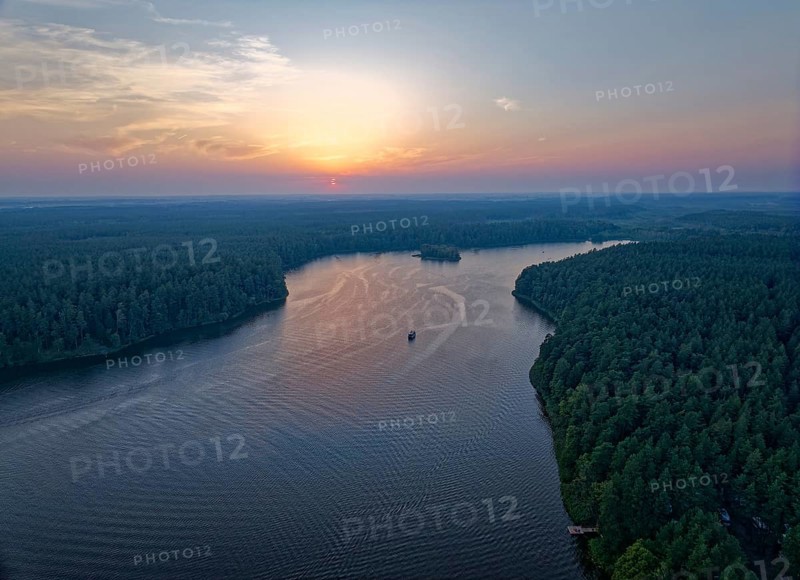 Aerial view of Lake Rospuda in the evening light in northern Poland. Augustow, Podlaskie, Poland, Europe