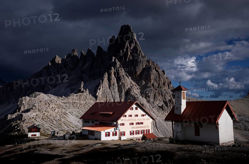 Stormy atmosphere, view of Dreizinnenhütte, chapel, Paternkofel, South Tyrol, Trentino, Sesto Dolomites, Italy, Europe