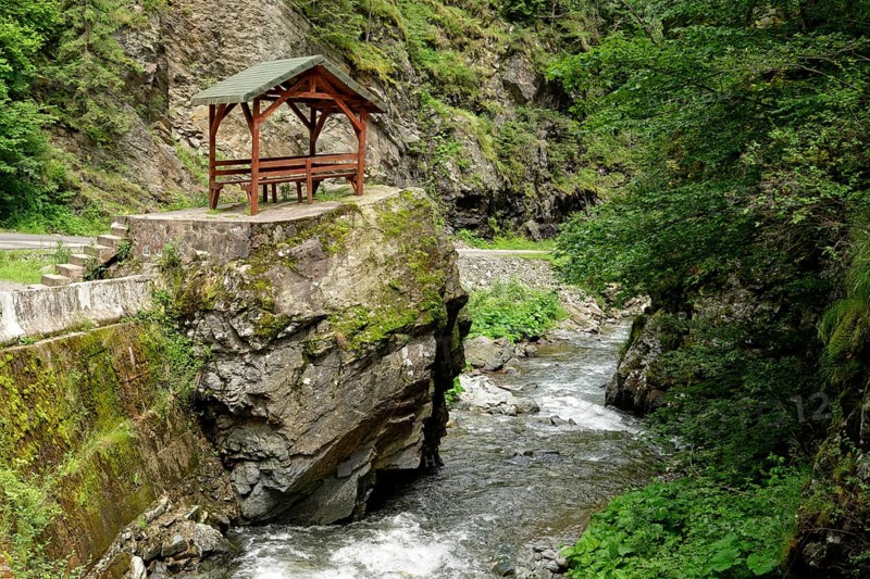 Resting place at Jiet Bach, a mountain stream in the Fagaras Mountains, also Fogarasch Mountains, in the southern Carpathians. Eisenmarkt County, Romania, South-Eastern Europe, Europe
