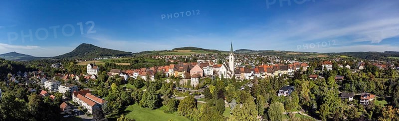 Aerial view of the old town of Engen with the Church of the Assumption of the Virgin Mary, on the left the Hegau volcanoes Hohenhewen and Hohenstoffeln, Constance district, Baden-Württemberg, Germany, Europe