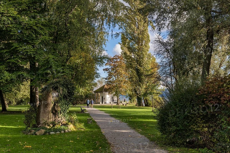 Footpath through Mettnaupark with memorial stone by the poet Joseph Victor von Scheffel and the Urkundenhäuschen, Radolfzell am Lake Constance, Konstanz district, Baden-Württemberg, Germany, Europe