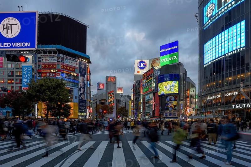 People cross the Shibuya crossroads, most frequented crossroads in the world, Shibuya, Tokyo, Japan, Asia