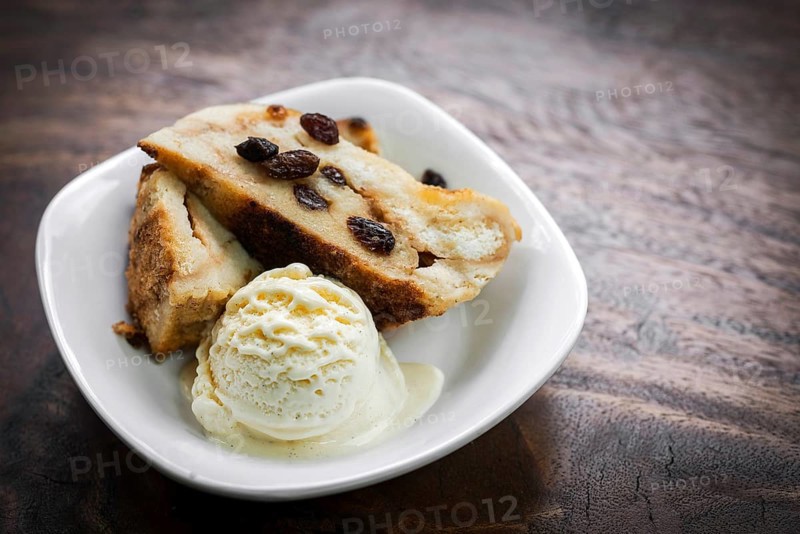 British traditional bread pudding with vanilla ice cream dessert